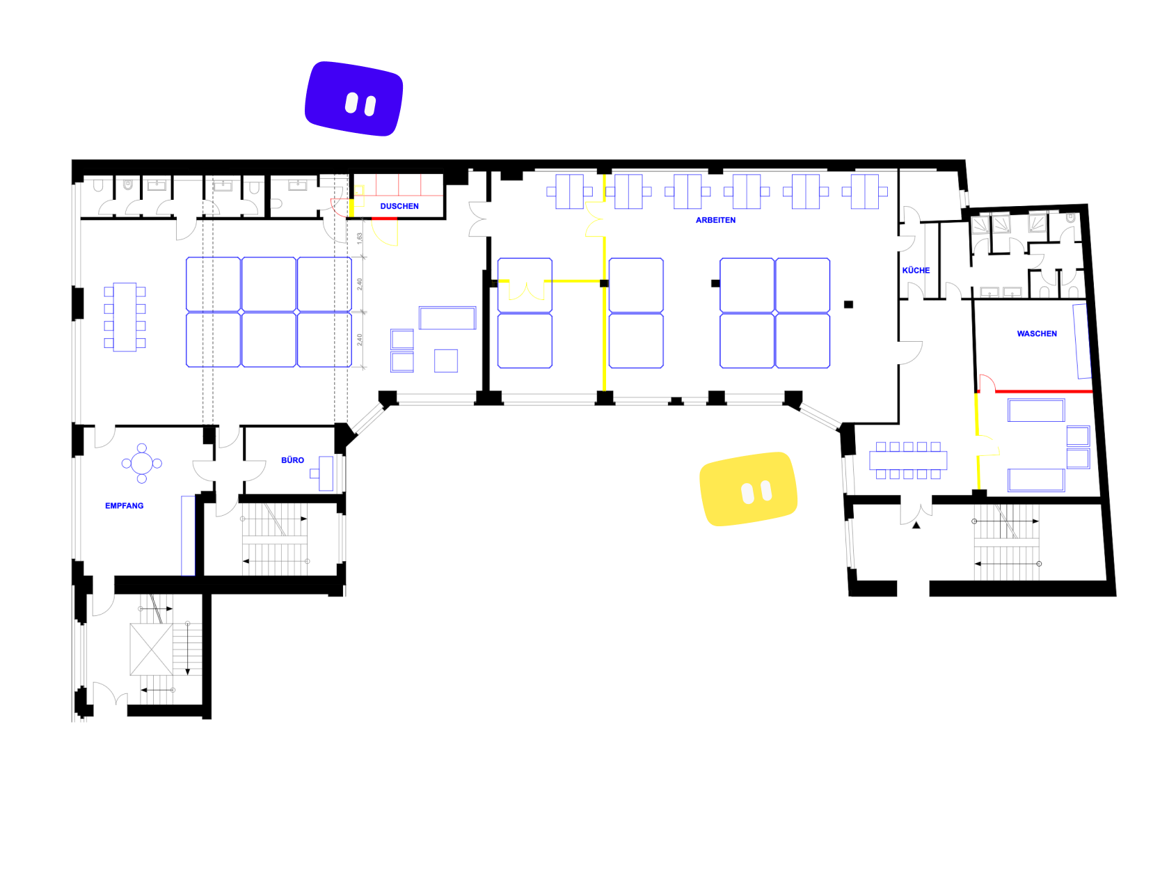 Grundriss einer Fläche mit eingeplanten Units, Duschen, Küche und Arbeitsbereich.